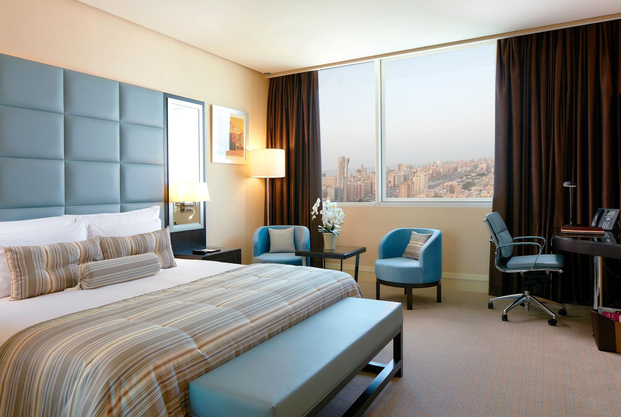 Millennium Hotel & Convention Centre Kuwait Kuwait City Exterior photo A room at the hotel