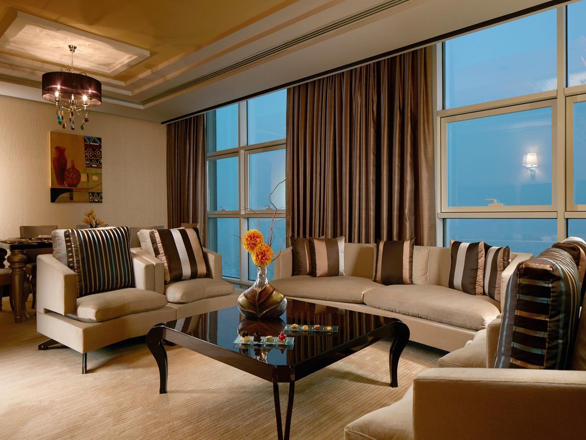 Millennium Hotel & Convention Centre Kuwait Kuwait City Exterior photo A living room in a suite at the Jumeirah Emirates Towers Hotel