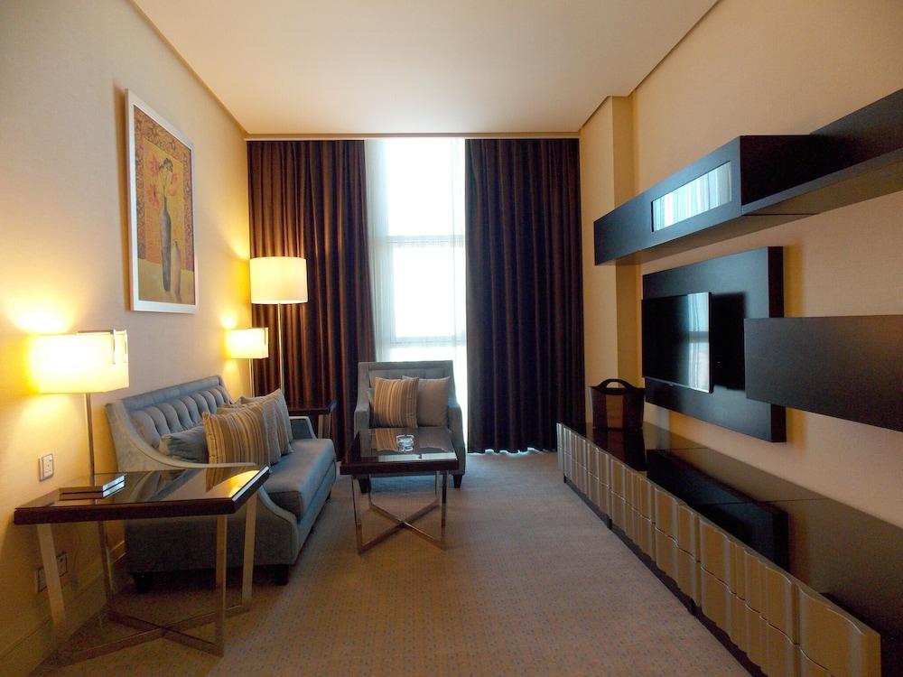 Millennium Hotel & Convention Centre Kuwait Kuwait City Exterior photo A living room in a suite at the Ritz-Carlton, Dubai